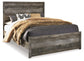 Cama con paneles Wynnlow, tocador con espejo y mesita de noche