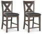 Mesa de comedor alta Caitbrook y dos taburetes