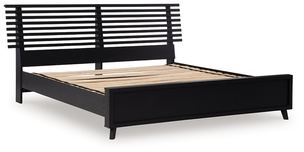 Cama con paneles de láminas Danziar