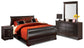 Cama estilo trineo Huey Vineyard con tocador con espejo y mesita de noche