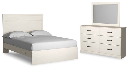 Cama Stelsie con paneles y tocador con espejo