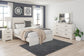 Cama Stelsie con paneles, cómoda con espejo y mesita de noche