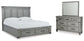 Cama California con almacenaje y tocador con espejo Russelyn