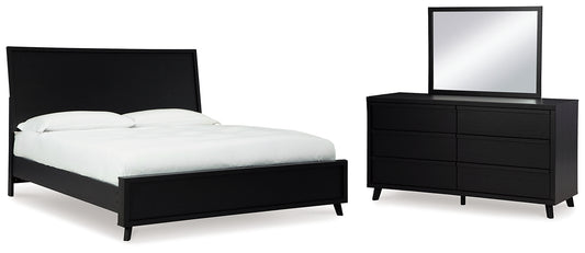 Cama con paneles Danziar y tocador con espejo
