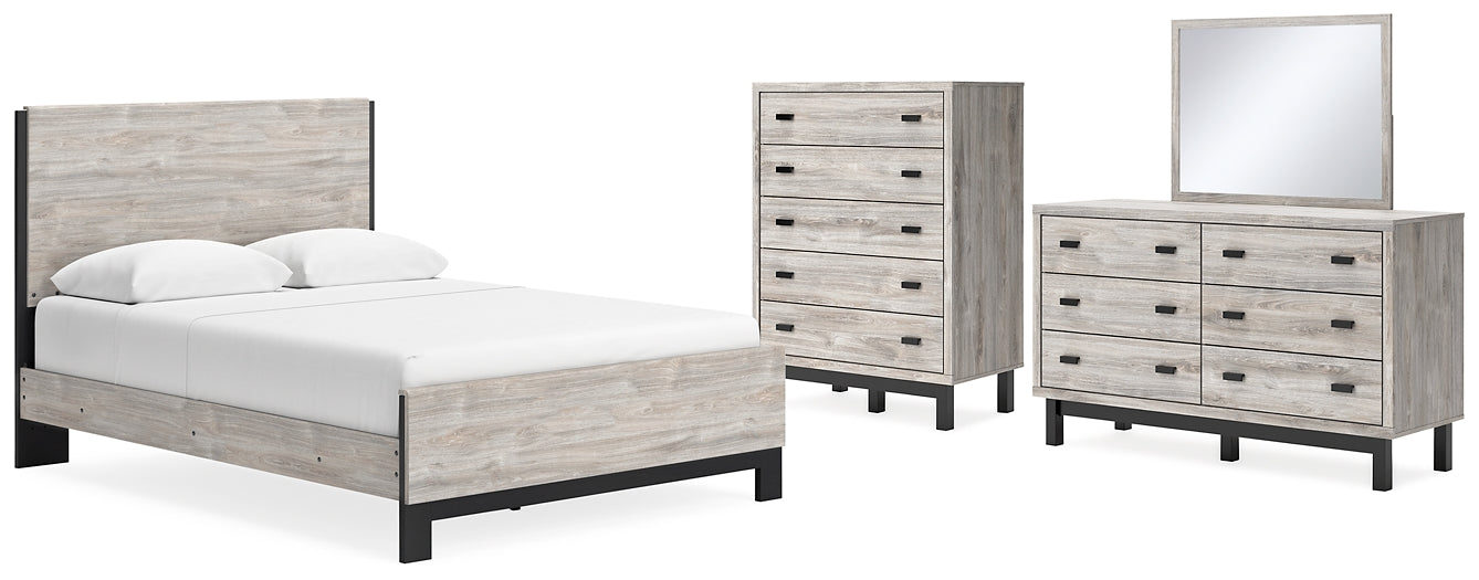 Cama Vessalli con paneles, cómoda y espejo