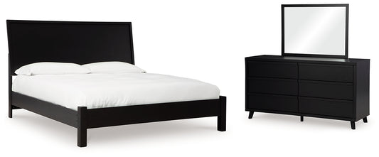 Cama con paneles Danziar y tocador con espejo