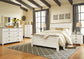 Cama Willowton con paneles, cómoda con espejo y mesita de noche
