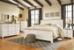 Cama Willowton con paneles, cómoda con espejo y mesita de noche