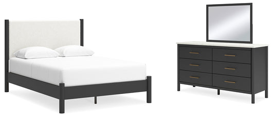 Cama Cadmori tapizada con paneles y cómoda con espejo