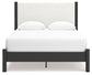 Cama Cadmori tapizada con paneles y cómoda con espejo
