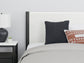 Cama Cadmori tapizada con paneles y cómoda con espejo
