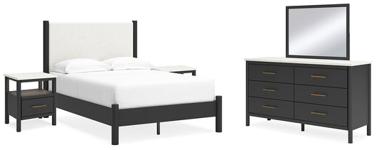 Cama Cadmori tapizada con paneles, cómoda con espejo y dos mesitas de noche