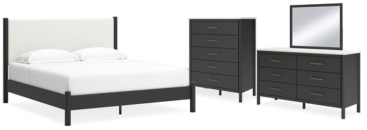 Cama Cadmori tapizada con paneles, cómoda y espejo