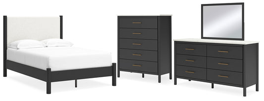 Cama Cadmori tapizada con paneles, cómoda y espejo