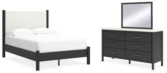 Cama Cadmori tapizada con paneles y cómoda con espejo