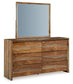 Cama con paneles California de Dressonni y tocador con espejo