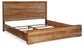 Cama con paneles California de Dressonni y tocador con espejo