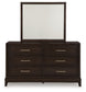 Cama tapizada Neymorton California con paneles y tocador con espejo