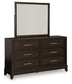 Cama tapizada Neymorton California con paneles y tocador con espejo