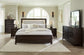 Cama tapizada Neymorton California con paneles y tocador con espejo