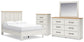 Cama con paneles Linnocreek, cómoda y espejo