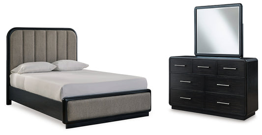 Cama tapizada Rowanbeck con paneles y tocador con espejo