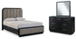 Cama tapizada Rowanbeck con paneles y tocador con espejo