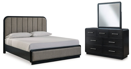 Cama tapizada Rowanbeck con paneles y tocador con espejo