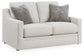 Sofá, loveseat, silla y otomana Maitelynn
