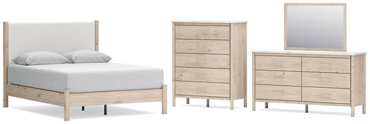 Cama Cadmori tapizada con paneles, cómoda y espejo