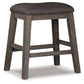 Taburete tapizado Caitbrook (2/CN)