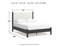 Cama Cadmori tapizada con paneles y cómoda con espejo