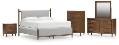Lyncott  Upholstered Bed, Dresser, Mirror, Chest And Nightstand