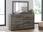 Graystorm  Panel Bed With Mirrored Dresser And Chest