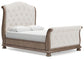Ardenfield  Upholstered Sleigh Bed With Mirrored Dresser And Nightstand