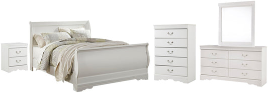 Cama tipo trineo Anarasia con tocador con espejo, cómoda y mesita de noche