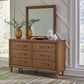 Lyncott  Upholstered Bed, Dresser, Mirror, Chest And Nightstand