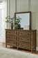 Sturlayne California  Upholstered Panel Bed, Dresser, Mirror And Nightstand